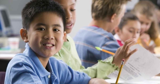 A smiling child in school