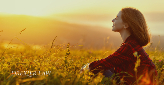Happy woman in the fields