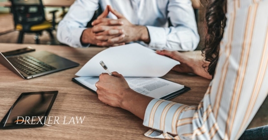 divorcing couple in lawyer's office